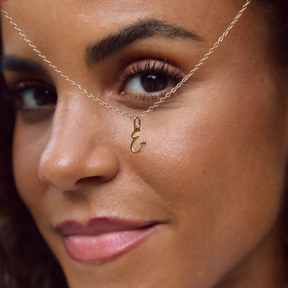 Gullhjartalaga hálsmen með bókstöfum