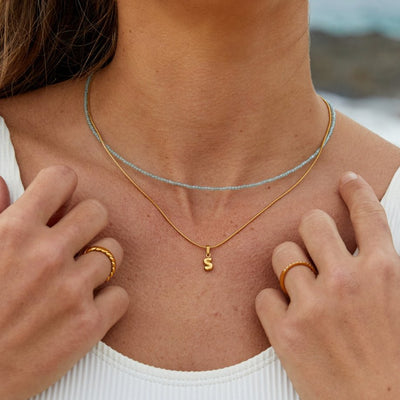 Hálsmen með kúlustafi